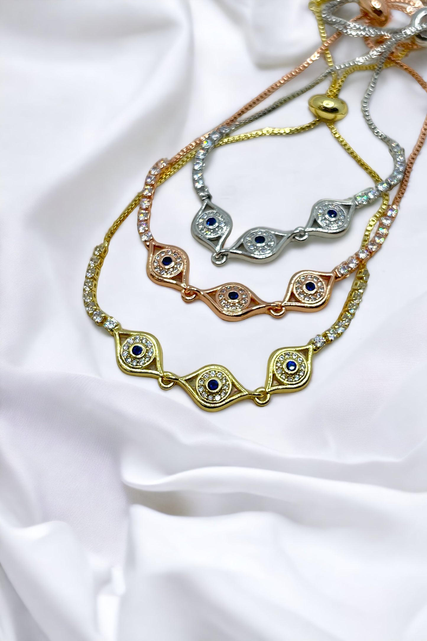 18K ADJ BRACELET THREE EVIL EYE