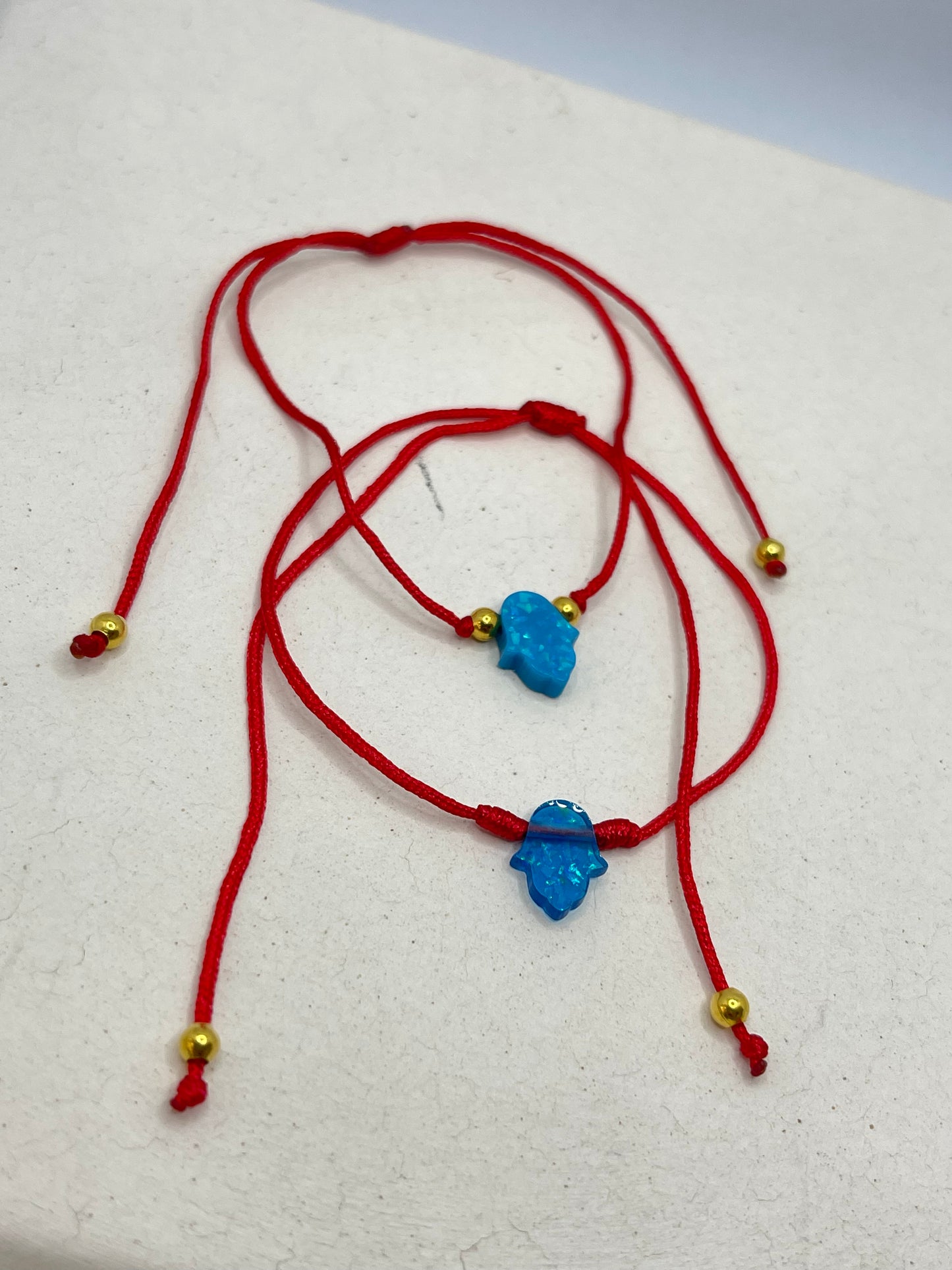 Opal acrylic red string