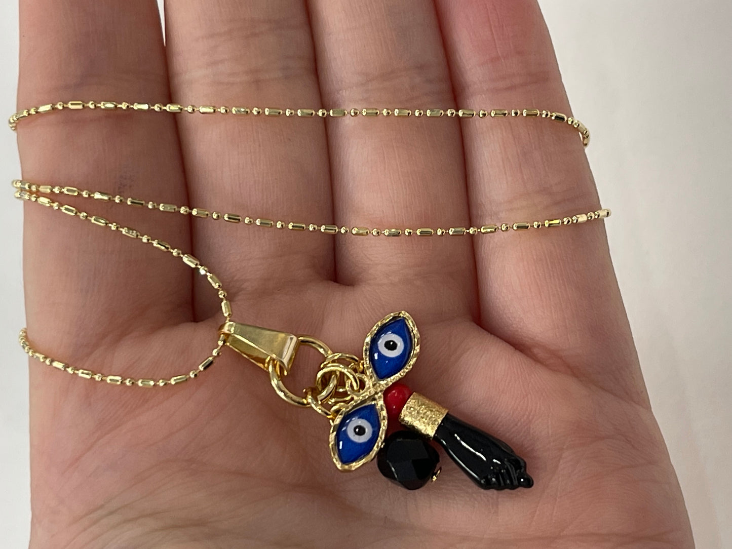 Azabache double eyes 18k gold-filled