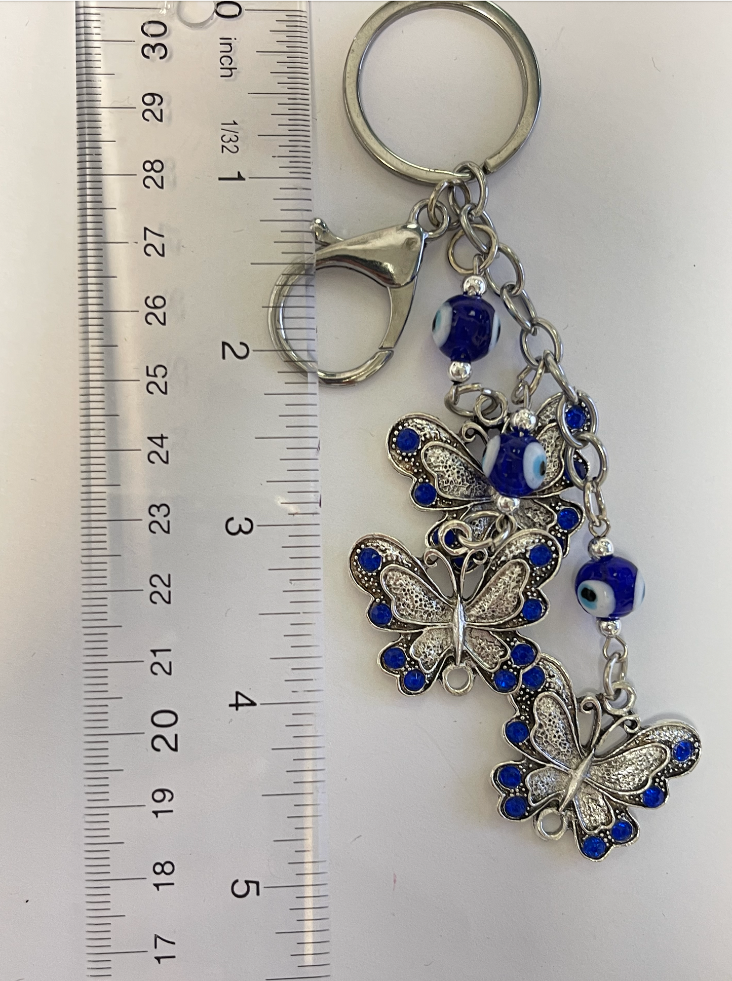 Multibutterfly evil eye Keychain stainless Steel.